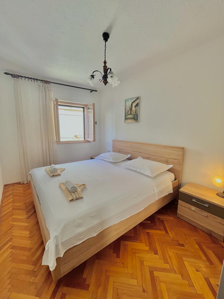 small apartament on the sea - bedroom